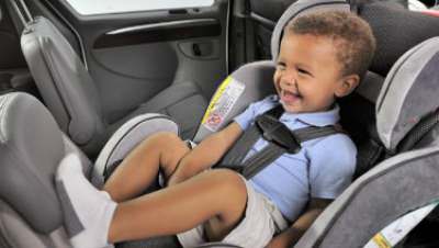 forward facing car seat in front seat of truck